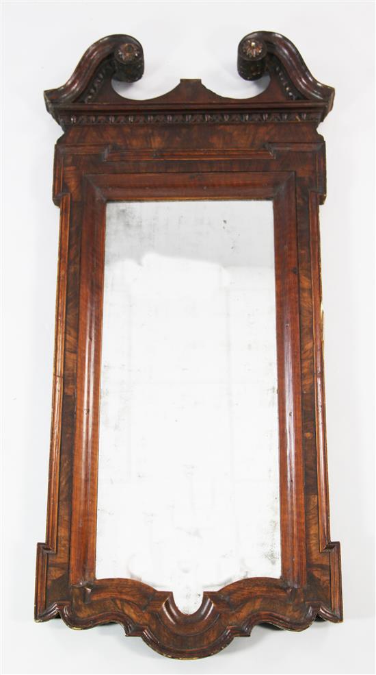 A mid 18th century style walnut wall mirror, 4ft 5in. x 1ft 11.5in.